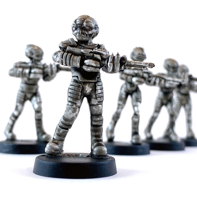 Unpainted 28mm sci-fi miniatures of Star Schlock's Sleazoid Marauders.