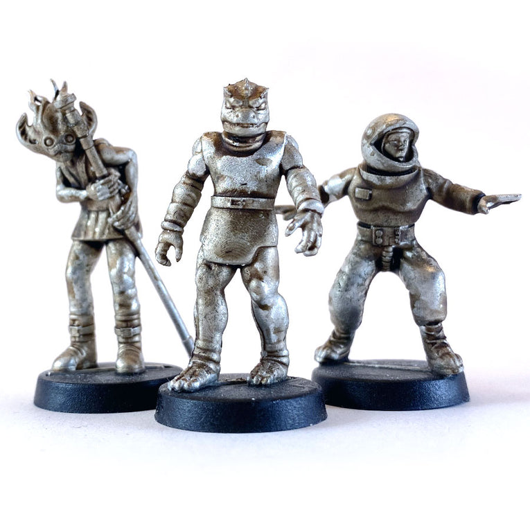 Unpainted 28mm miniatures of Star Schlock's alien bystanders.
