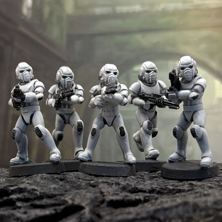 Painted 28mm miniatures of Star Schlock's armored sci-fi infantry, the Dronetroopers pattern A.