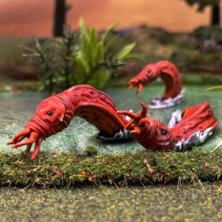 Plastic worm creatures, tokens for the Star Schlock skirmish game.