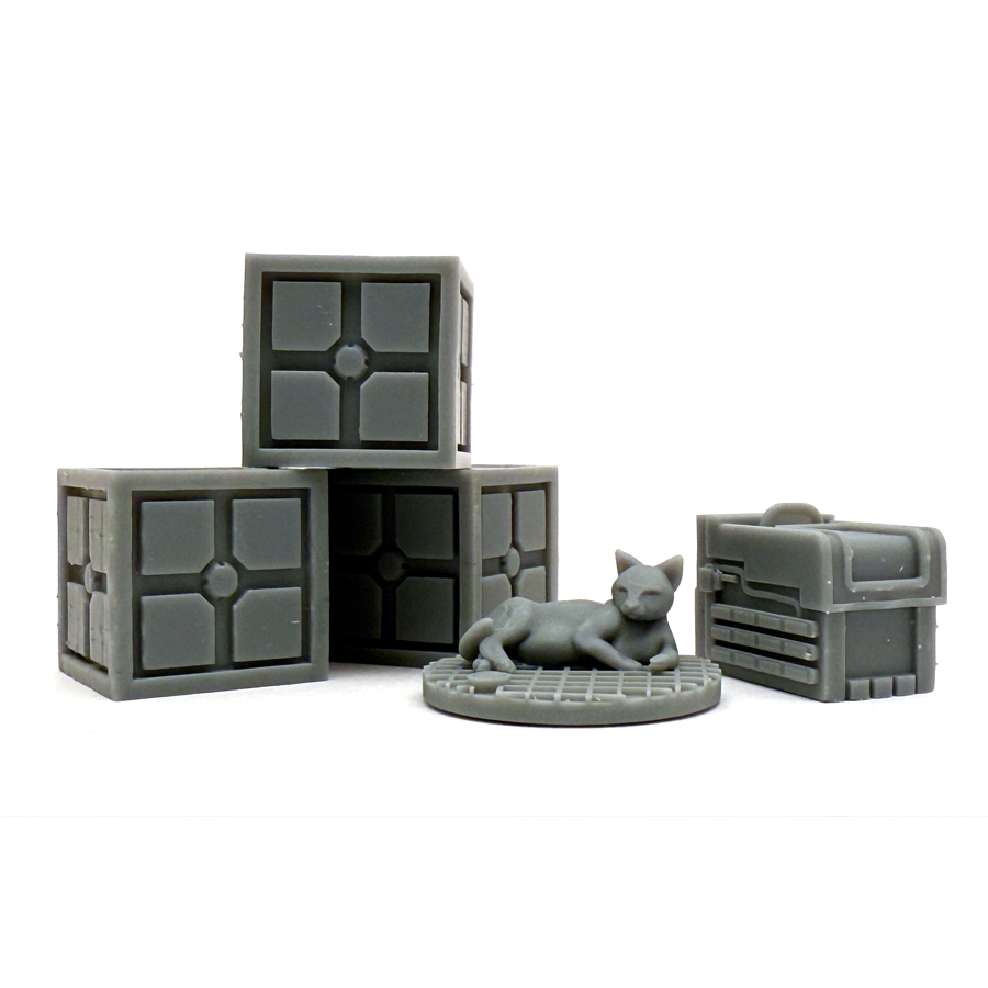 Cargo crate miniatures and a starship cat for use in the Star Schlock tabletop miniatures wargame.