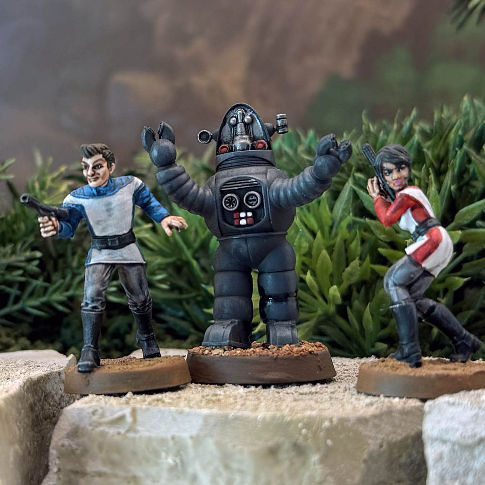 Painted 28mm Star Schlock sci-fi miniatures — heroic explorers with a robot companion
